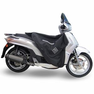 TABLIER COUVRE JAMBE TUCANO POUR KYMCO 125 FLY 2013+ (R066-X) (TERMOSCUD) (SYSTEME ANTI-FLOTTEMENT SGAS)